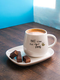 High angle view of coffee cup on table