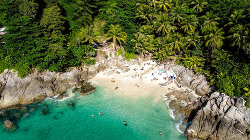 High angle view of rocks by sea