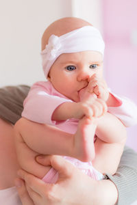 Portrait of cute baby at home