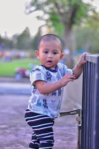 Portrait of cute girl standing outdoors