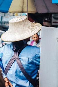 Rear view of couple sitting in car