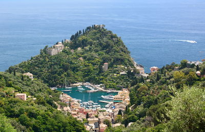 High angle view of harbor and buildings in city