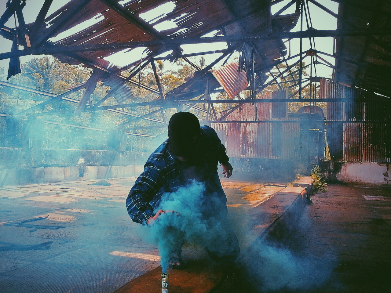 one person, screenshot, architecture, reflection, built structure, adult, day, smoke, nature, occupation, full length, person, men, pc game, outdoors, motion