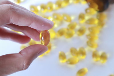 Close-up of hand holding ice cream
