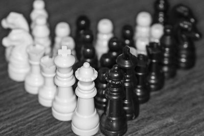 Close-up of chess pieces on table