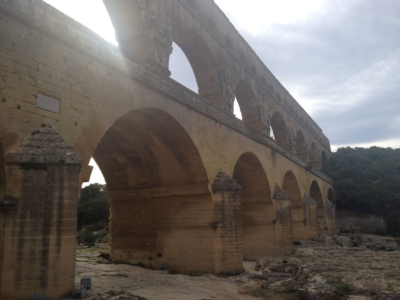 LOW ANGLE VIEW OF OLD ARCH BRIDGE