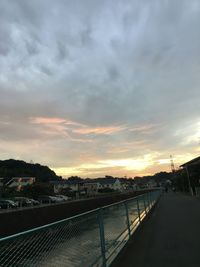 Scenic view of bridge against sky during sunset