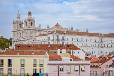 Lisbon panoramic view. colorful walls of the buildings of lisbon, with orange roofs 