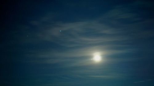 Low angle view of moon in sky at night