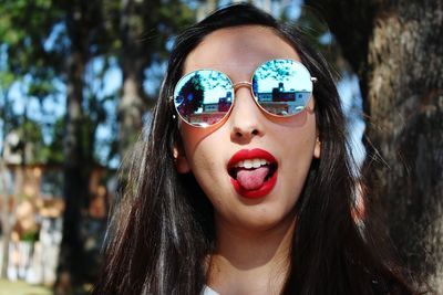 Portrait of woman wearing sunglasses