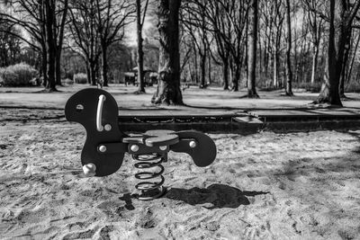 View of park bench on field