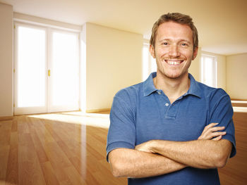 Portrait of smiling man at home