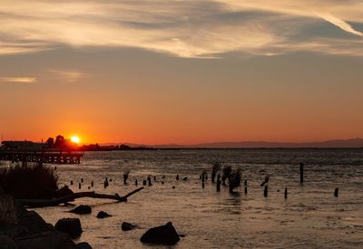 Scenic view of sea against sky during sunset