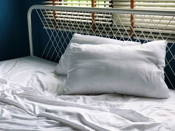 High angle view of pillows on bed