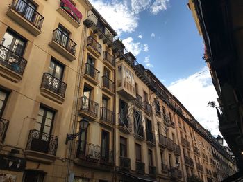 Low angle view of residential building against sky