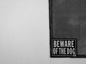 Close-up of text on wall