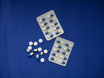 High angle view of objects against blue background