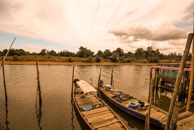 Scenic view of river against sky during sunset