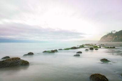 Scenic view of sea against sky during sunset