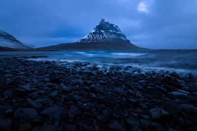 View of the kirkjufell mountain from grundarfjordur in the snaefelsness peninsula, iceland