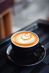 Coffee cup on table