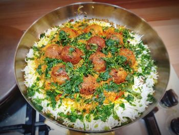 High angle view of vegetables in plate on table