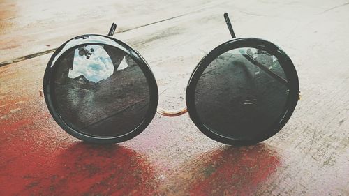 Close-up of sunglasses on table