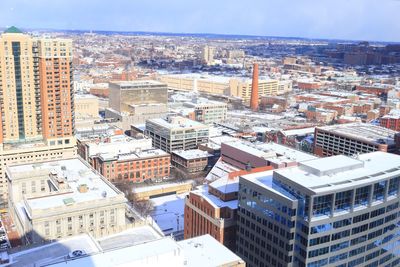 Aerial view of cityscape against sky