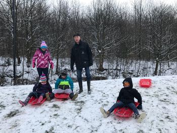 Boys playing on snow field