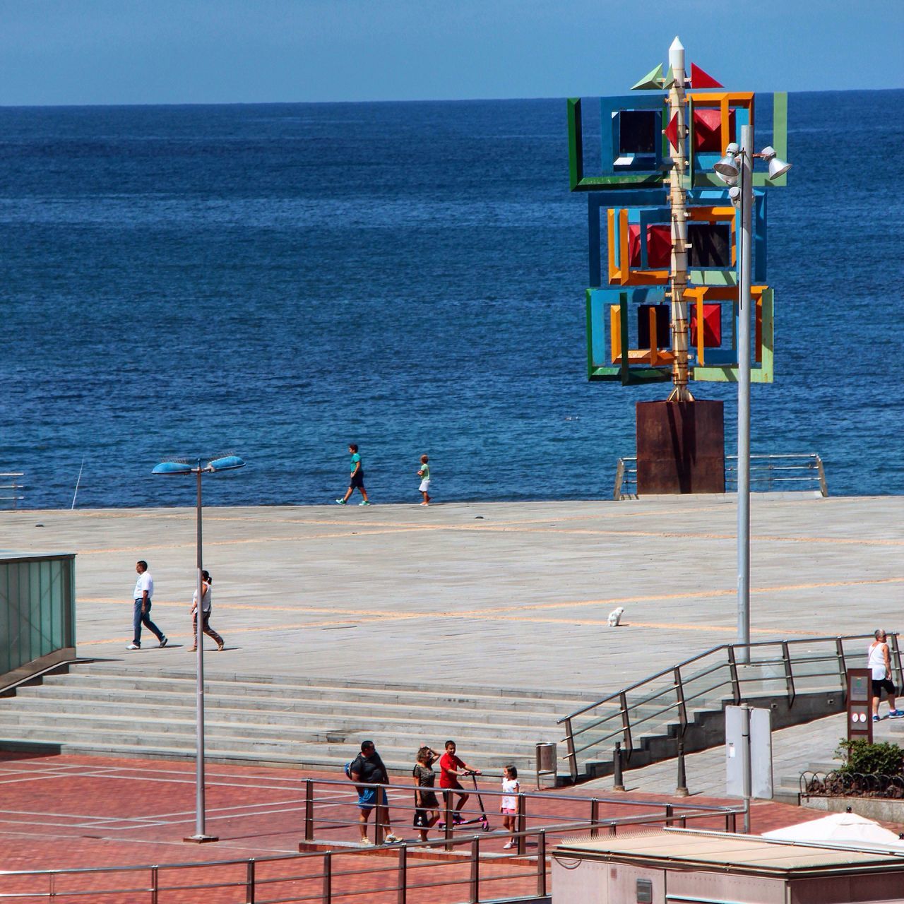 water, sea, lifestyles, leisure activity, men, person, horizon over water, togetherness, railing, pier, rear view, built structure, vacations, boys, blue, large group of people, nature, weekend activities