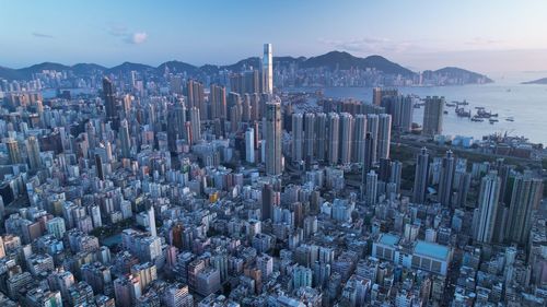 Sham shui po, hong kong skyline- high angle view of cityscape against sky