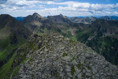 Panoramic aerial view of climbers on the mountain overlooking the lake of bombasel trentino