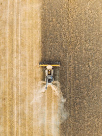 High angle view of machinery on farm against wall