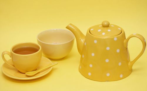 Close-up of tea cup against white background