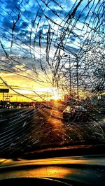 Scenic view of sunset seen through car windshield