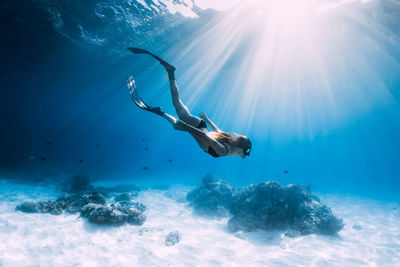 Man swimming in sea