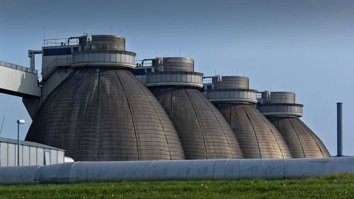 Low angle view of water tank against sky