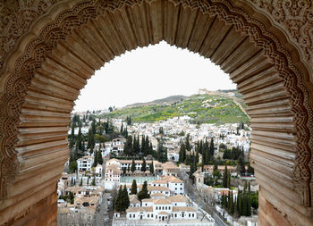 Buildings seen through arch