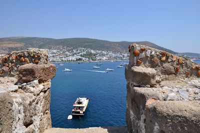 Scenic view of sea against clear blue sky