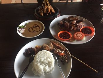 High angle view of food served on table