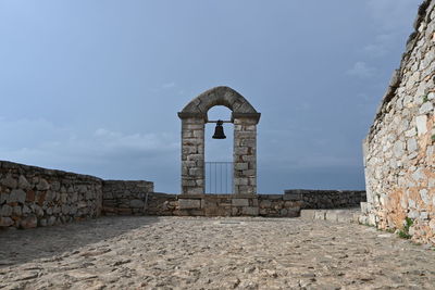 Low angle view of old ruins against clear sky