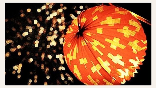 auto post production filter, low angle view, multi colored, transfer print, arts culture and entertainment, orange color, outdoors, pattern, no people, close-up, celebration, butterfly, umbrella, butterfly - insect, yellow, natural pattern, nature, night, animal themes