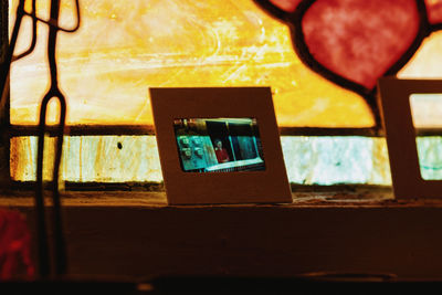 Close-up of water on table against window