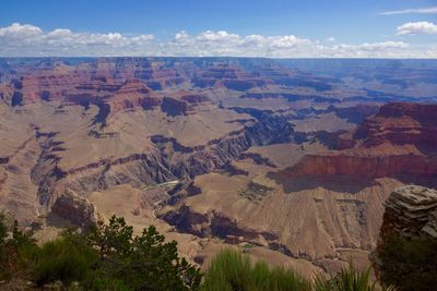 Scenic view of rocky mountains on sunny day at grand canyon national park