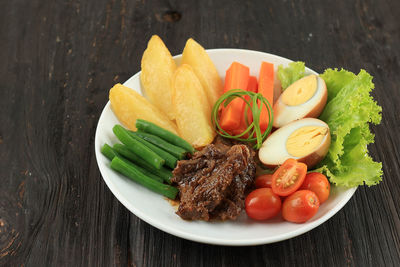 High angle view of food in plate on table