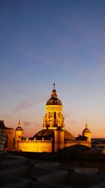 Cathedral of building against sky during sunset