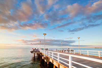 Pier over sea against sky