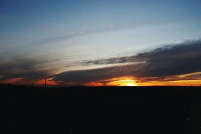 Scenic view of landscape at sunset