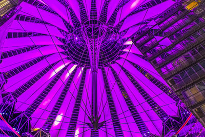 Low angle view of illuminated decoration hanging at night