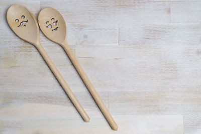 Directly above shot of wooden spoons on table